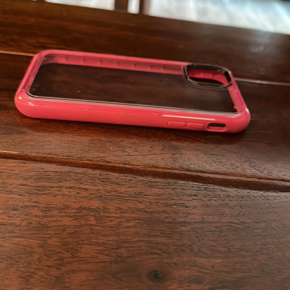 Otter box, clear back with bright pink sides, Gently used1 week, Excellent cond.